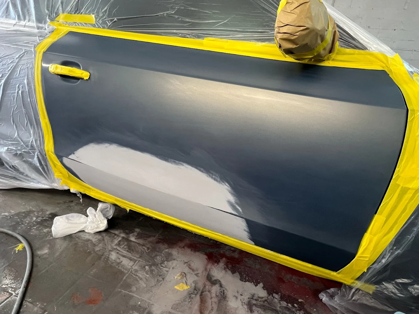 A vehicle being repaired in the RG workshop